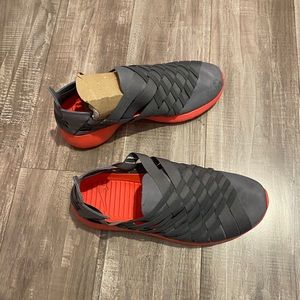 Pink and grey woven slip on sneakers